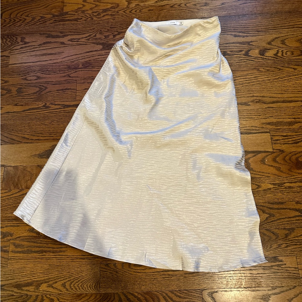 Lush satin midi skirt with slit and subtle zebra like design